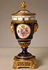 Attractive porcelain vase clock in Louis XVI-style