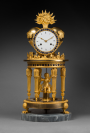 Case Attributed to Jean-Simon Deverberie (1764 - 1824)
Rare Chased and Gilt Bronze Mantel Clock 
“The Temple of Love”  
Paris, Directoire period, circa 1795 
Height 51 cm; diameter 23 cm