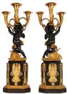 A pair of important French Empire ormolu and bronze sculptural candelabra, 'Hunting' circa 1800.